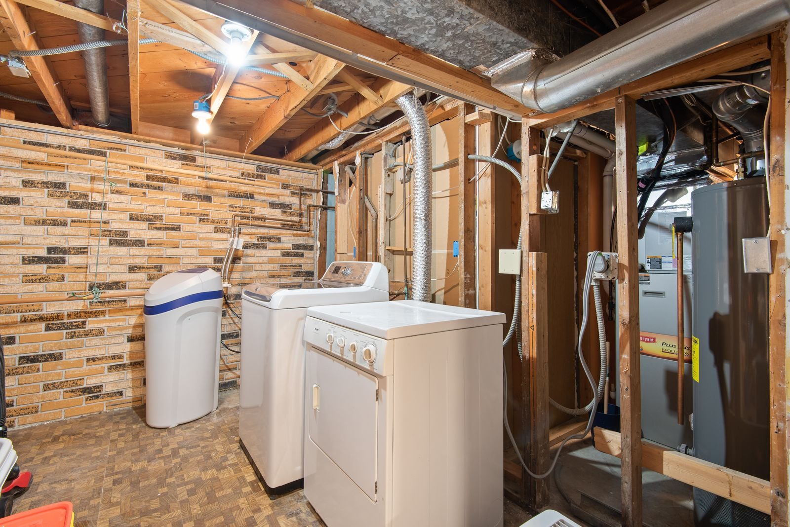 High-efficiency furnace installed in a basement utility room